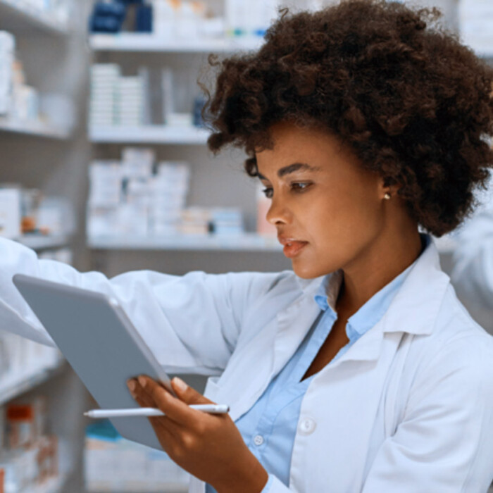 Tuality Healthcare home page image of a pharmacist