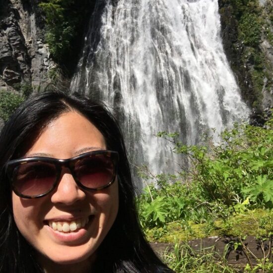 Alexis Wong near a waterfall.