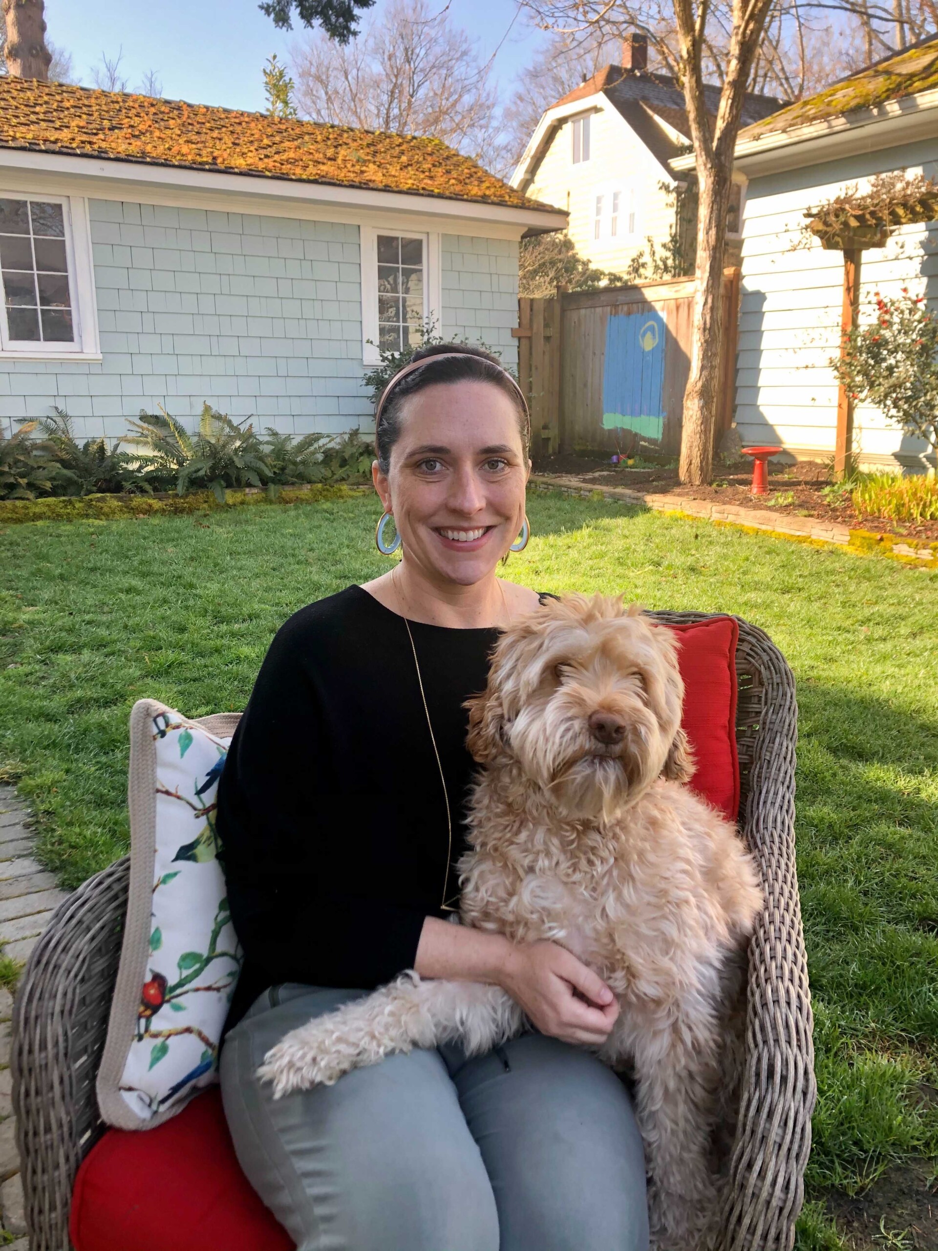 Informal portrait of Meaghan Burns with her dog.