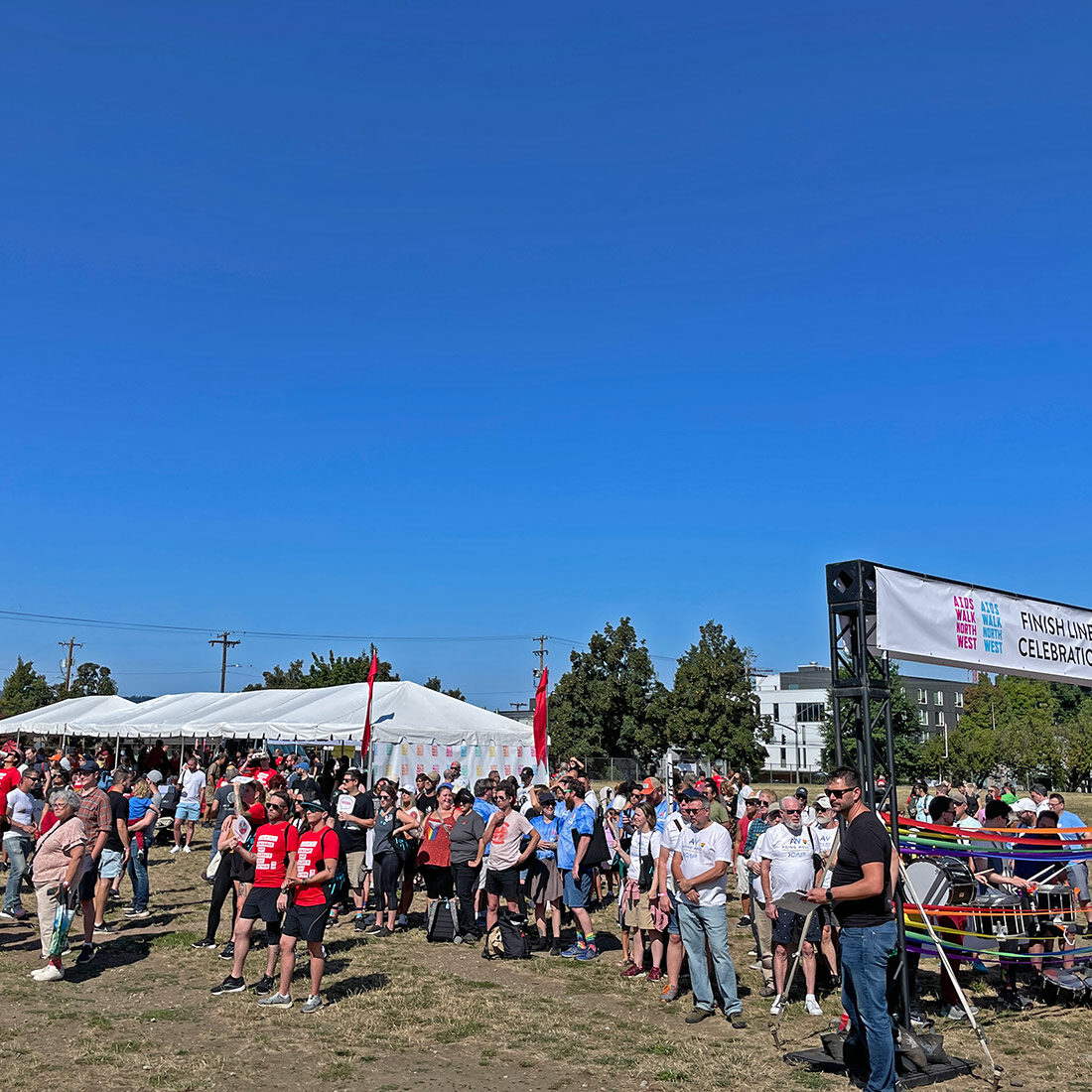 Participants gather under a brilliant blue sky for Cascade AIDS Project's annual AIDS walk.