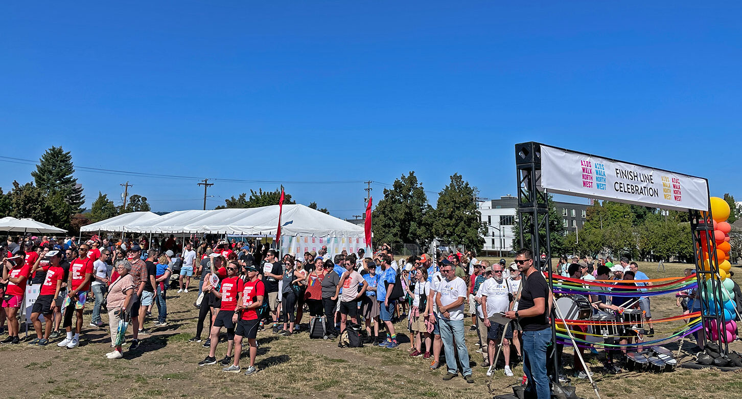 Participants gather under a brilliant blue sky for Cascade AIDS Project's annual AIDS walk.