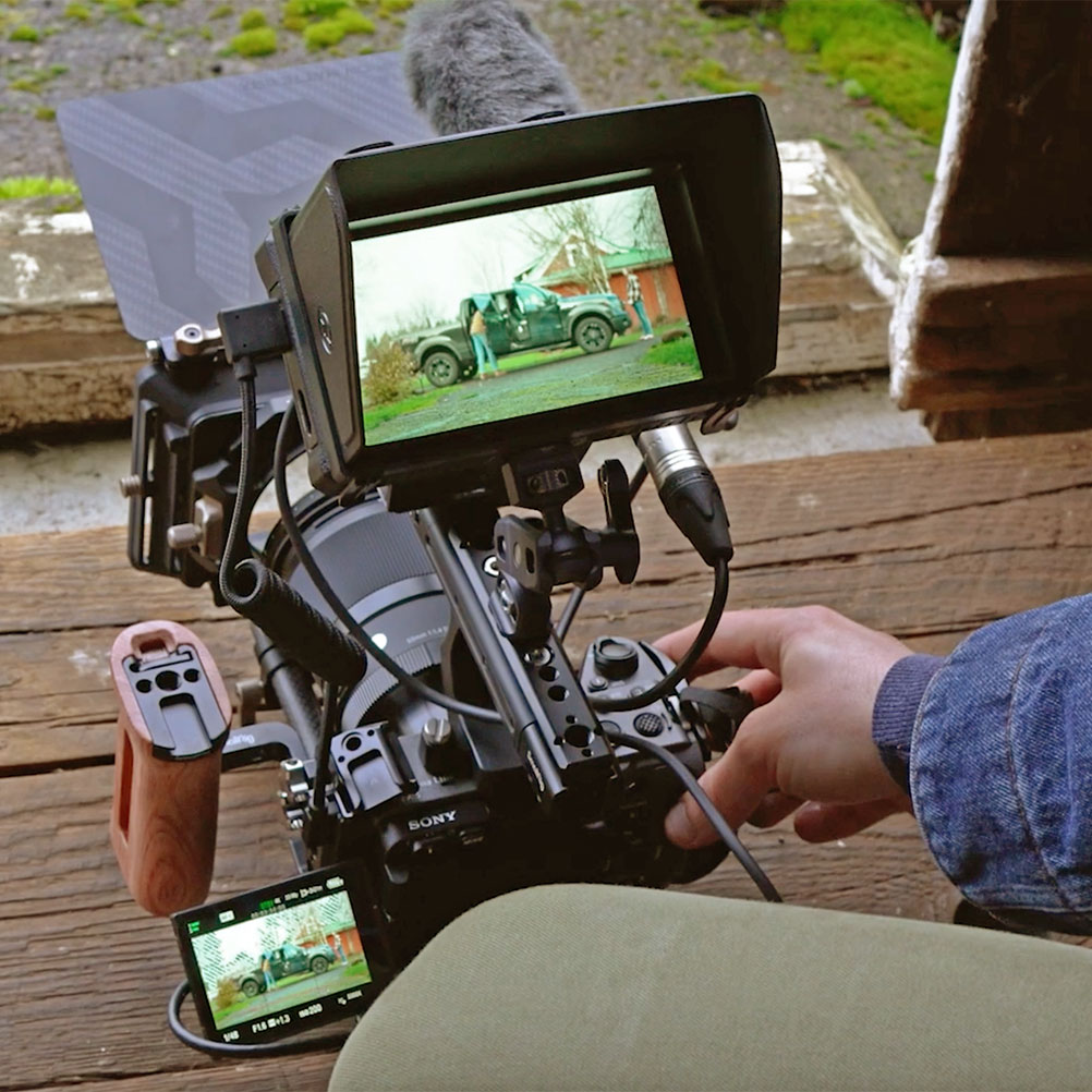 Closeup of a video camera during an onsite video shoot for an ODOT Transportation Safety PSA.