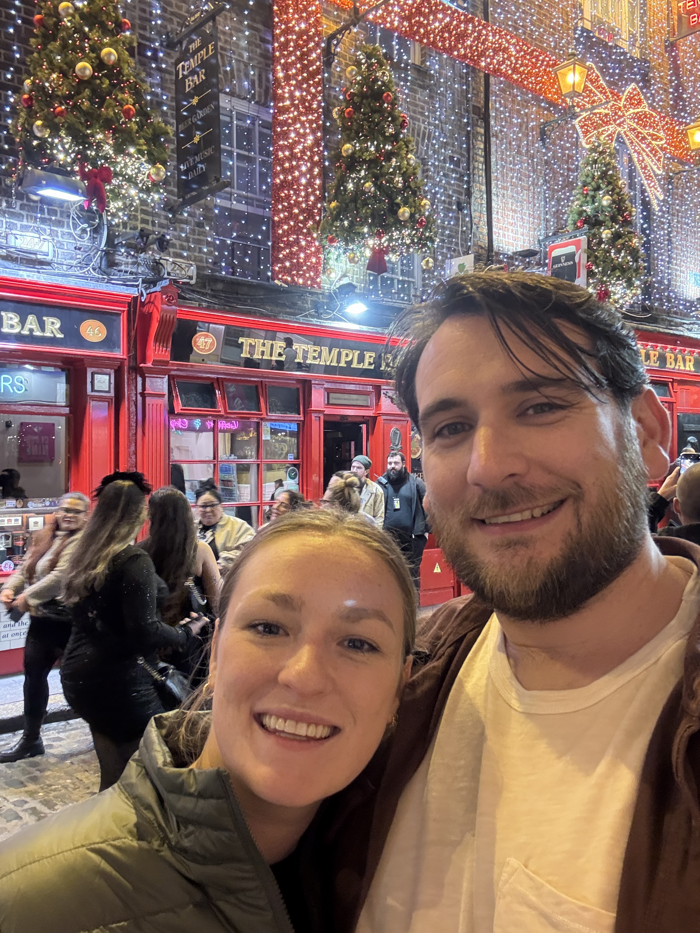 Erica Schroder and her partner on a street decked out for Christmas in Ireland.