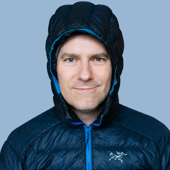 employee Scott Benish wearing a puffy blue parka